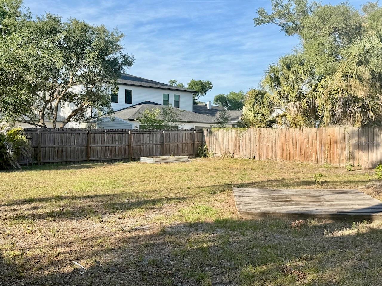 backyard - alley along back fence