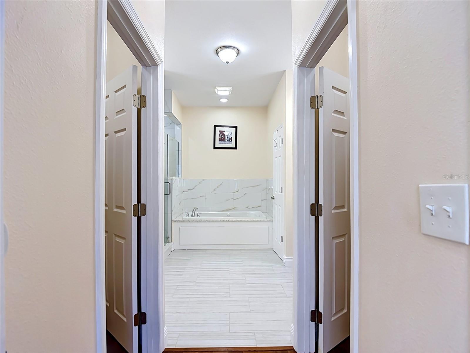 Primary Bathroom Suite w/His & Hers walk in closets