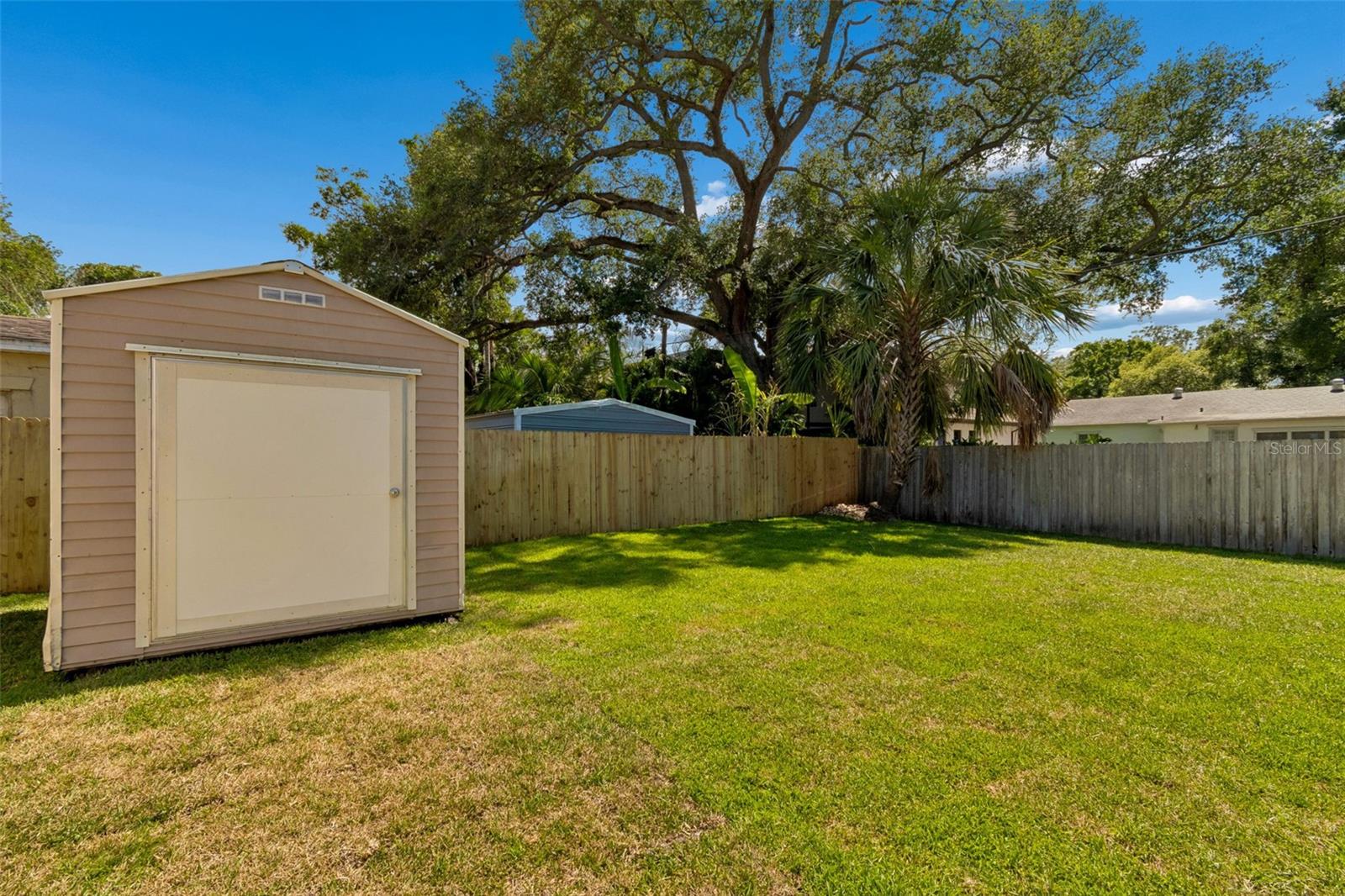Fully fenced backyard for your furry friends!