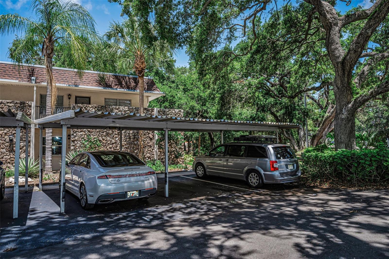 Condo 109!  Ground Floor End unit! Covered Parking Right outside your condo!