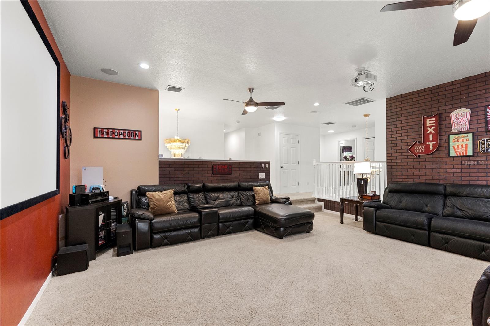 Theatre room with projector and screen