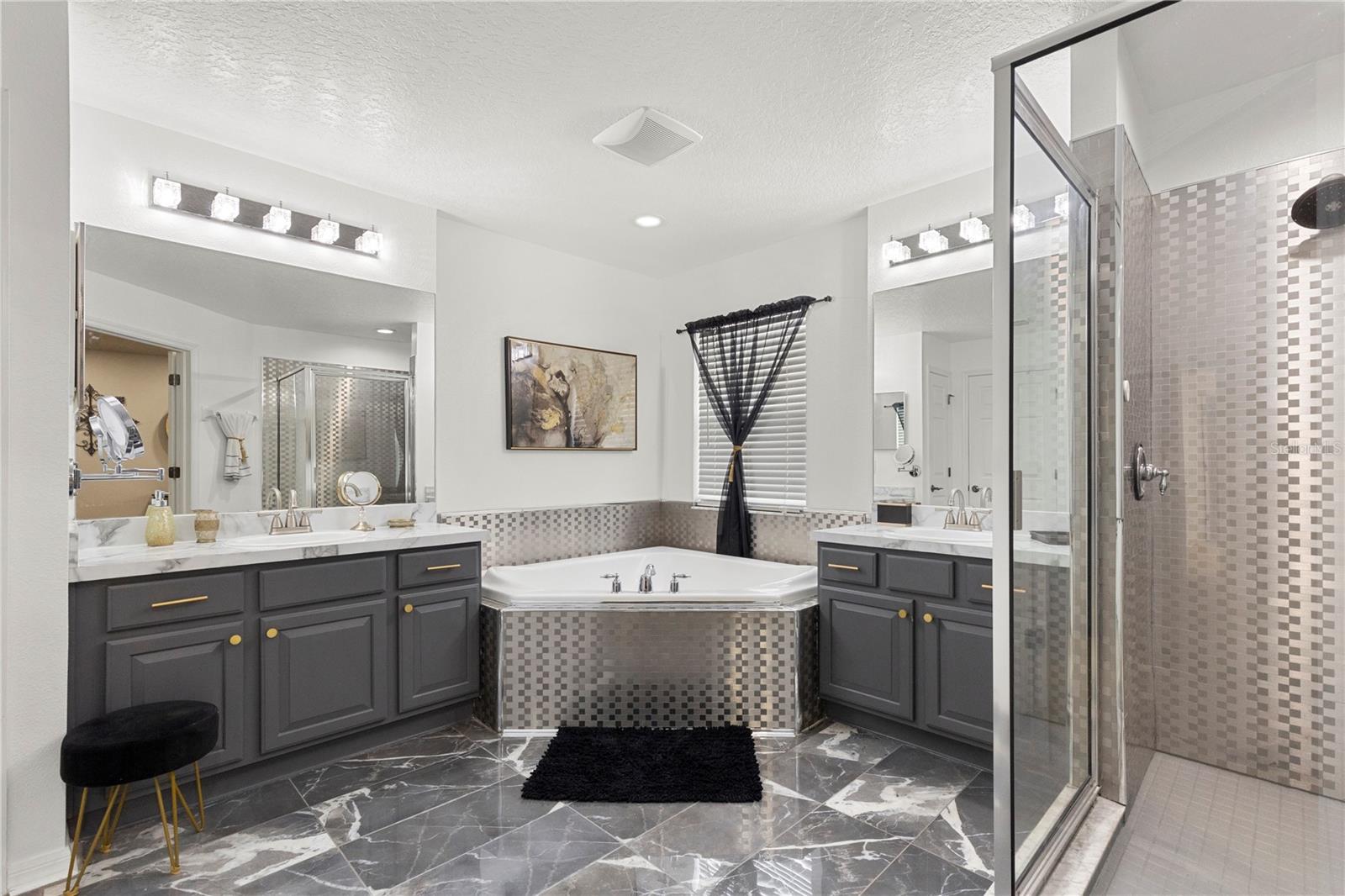 Ensuite with soaking tub, walk-in shower and water closet