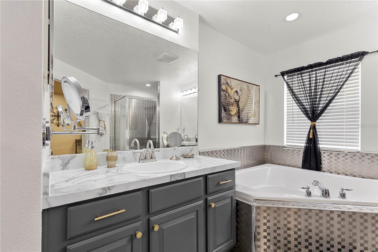 Ensuite with soaking tub, walk-in shower and water closet