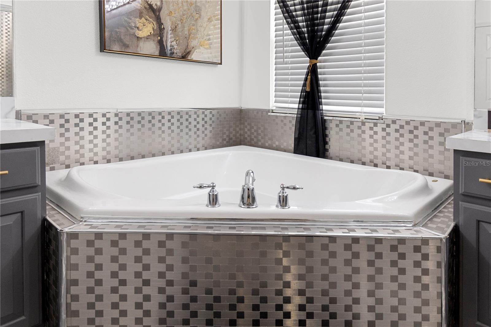 Ensuite with soaking tub, walk-in shower and water closet