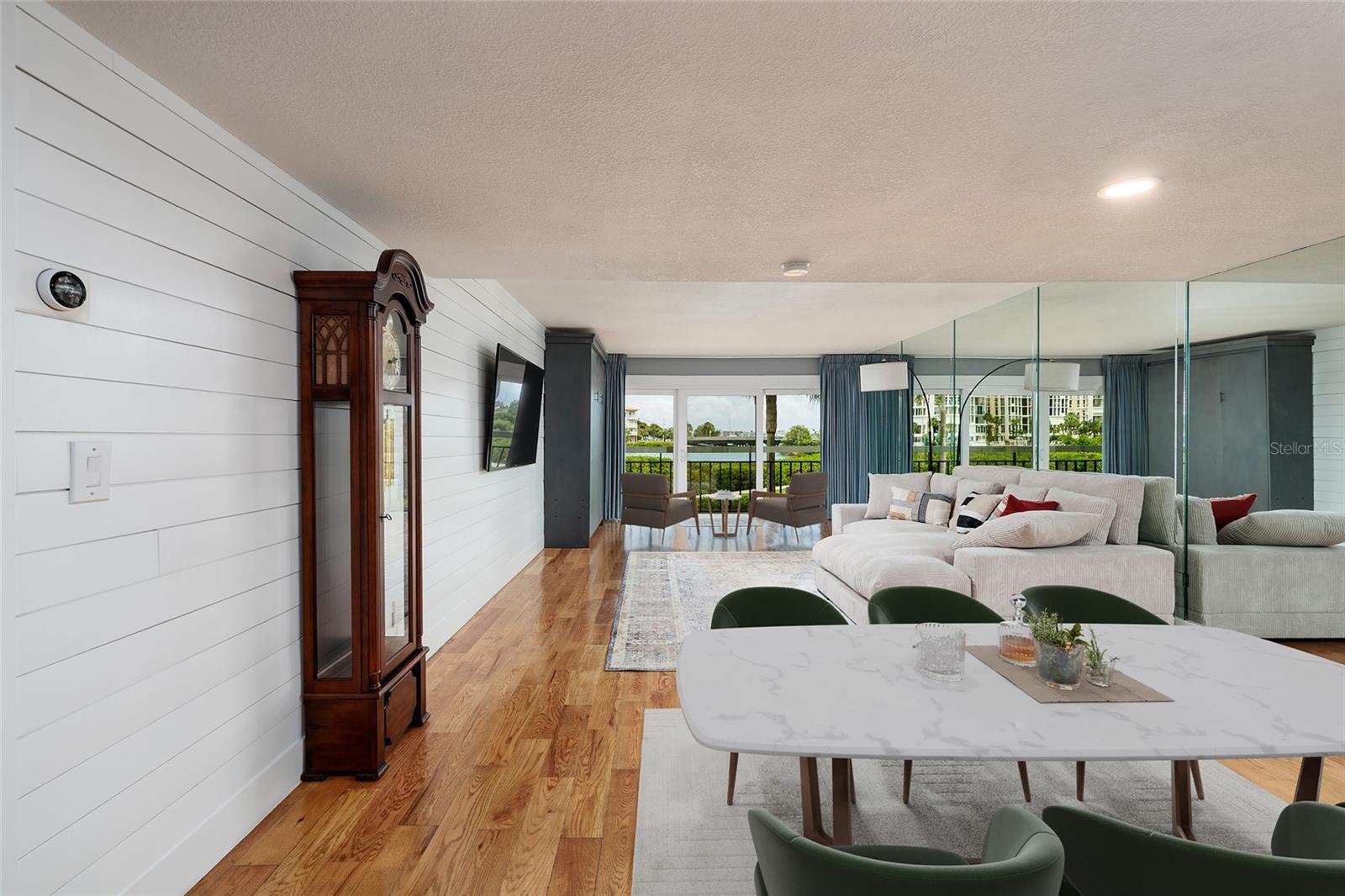 Virtual staged. Dining area to living room