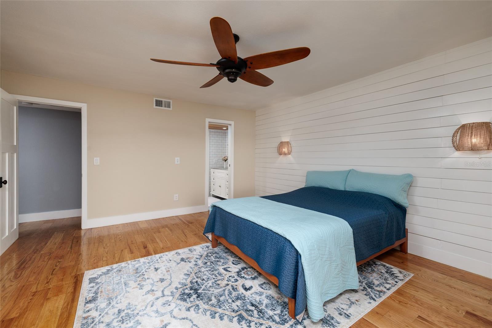 2nd view bedroom with entrance for privacy and slider door to bathroom and walk in closet