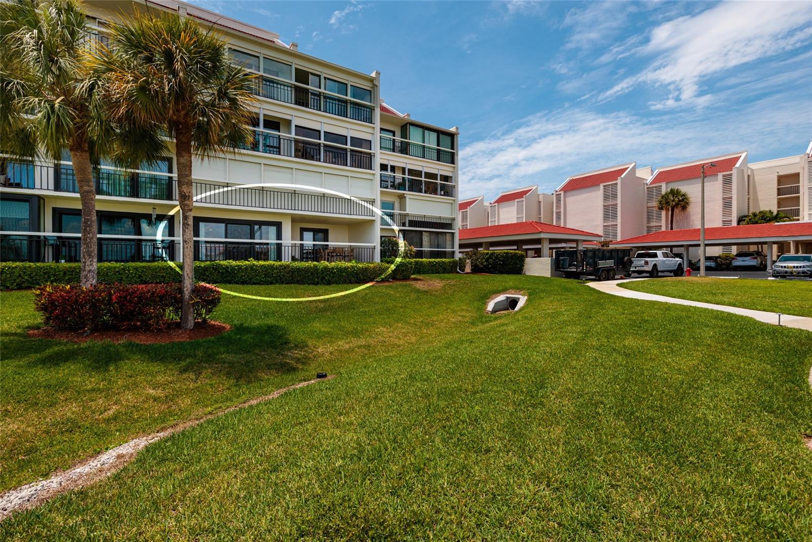 Western View of rear building with circle reflecting unit 107 location