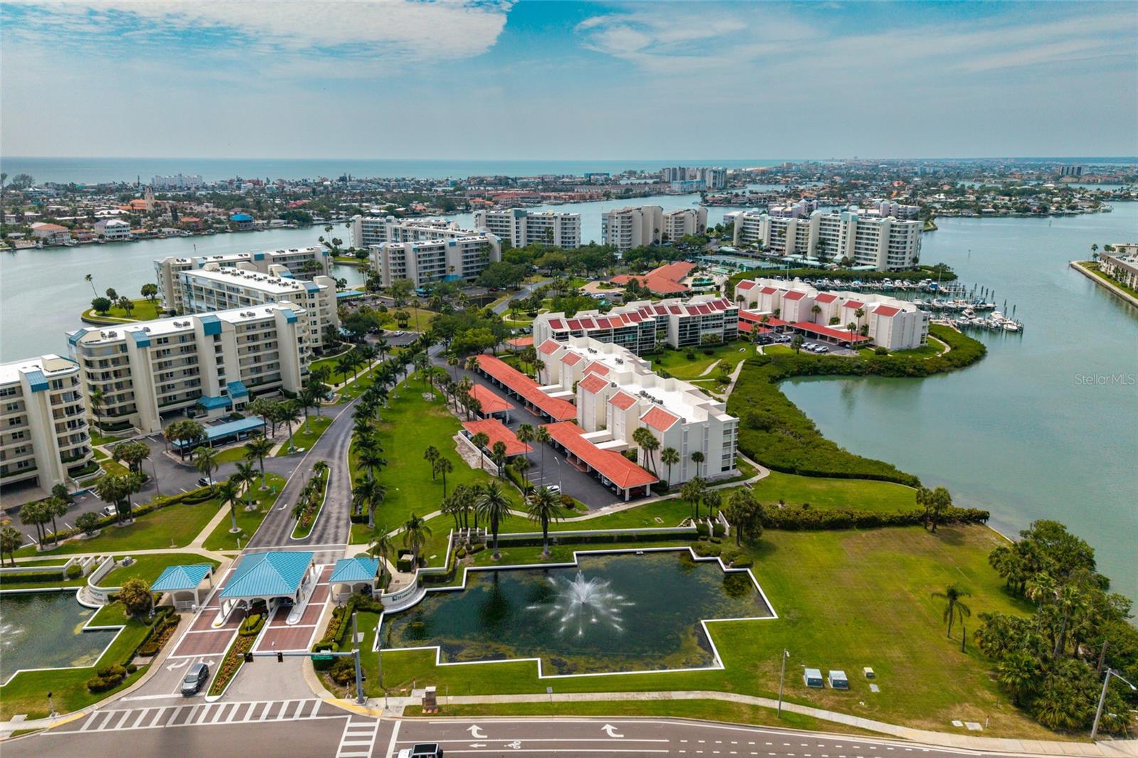 Aerial view of entrance with immediate north view of red tiled buildings (Ranger middle in center)