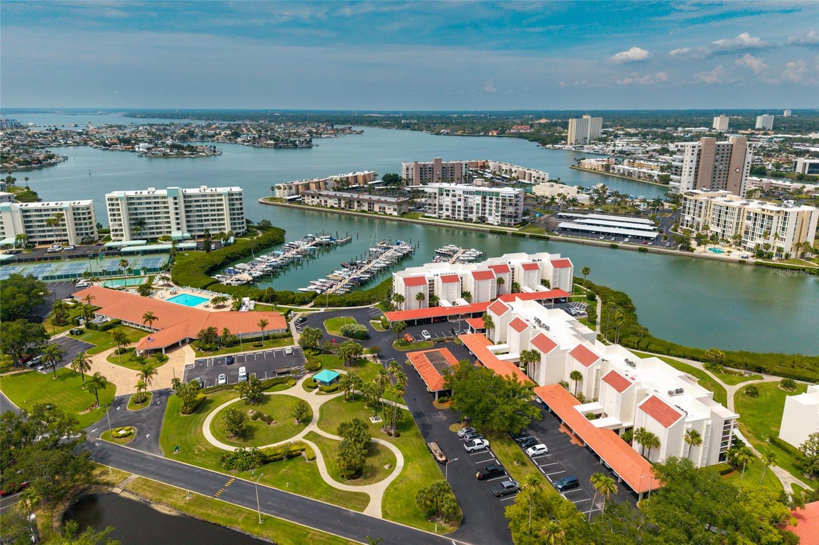 Aerial view of the red tiled buildings; just a few steps to the community building (to left side of picture)