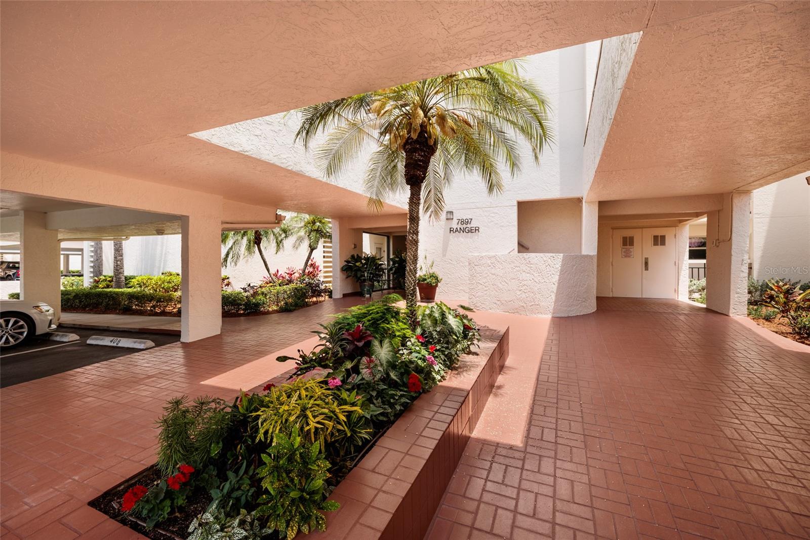 Builing entrance; unit 107 just steps from the elevators