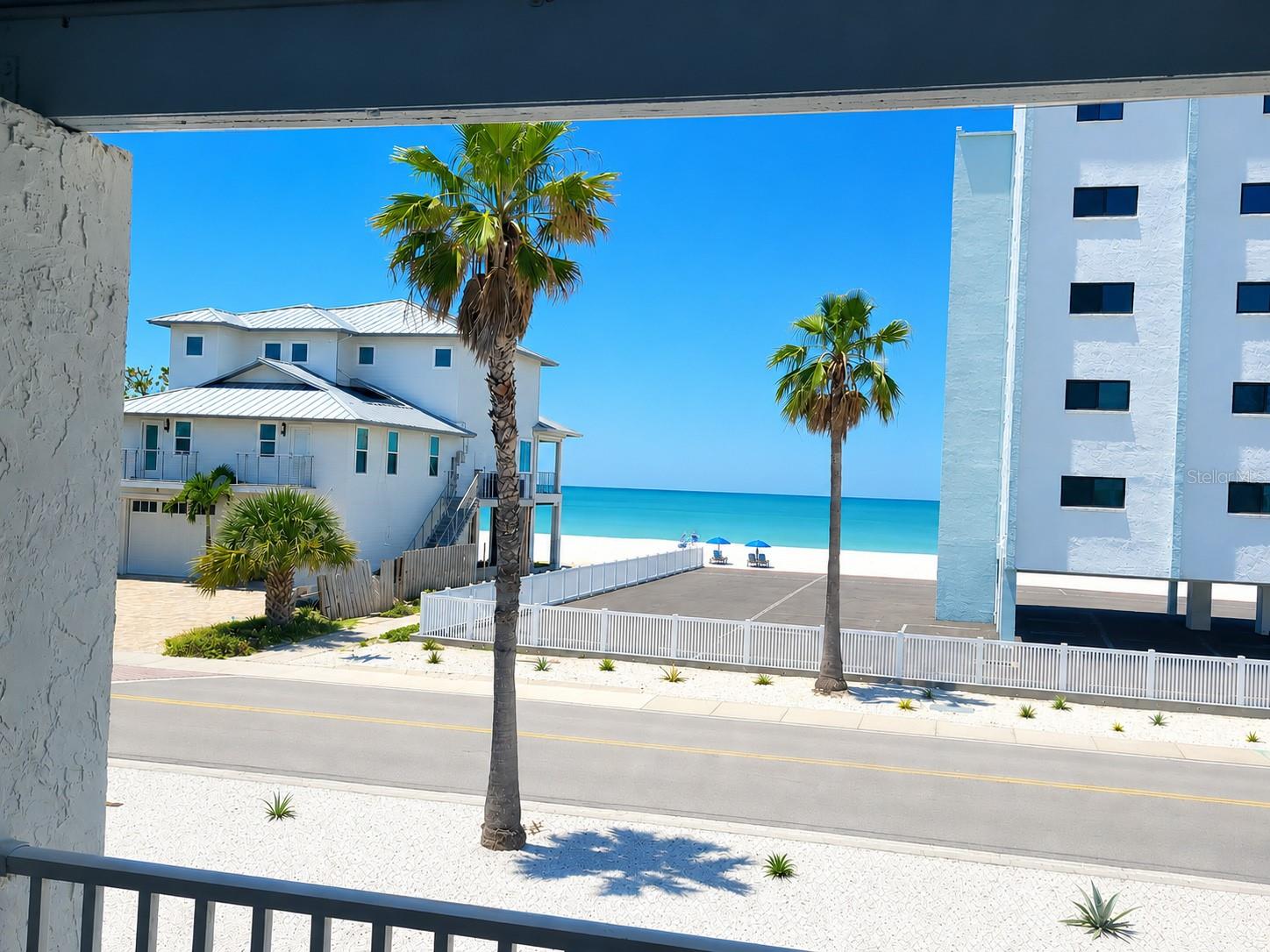 VIEW FROM BALCONY & LIVING RM WINDOW