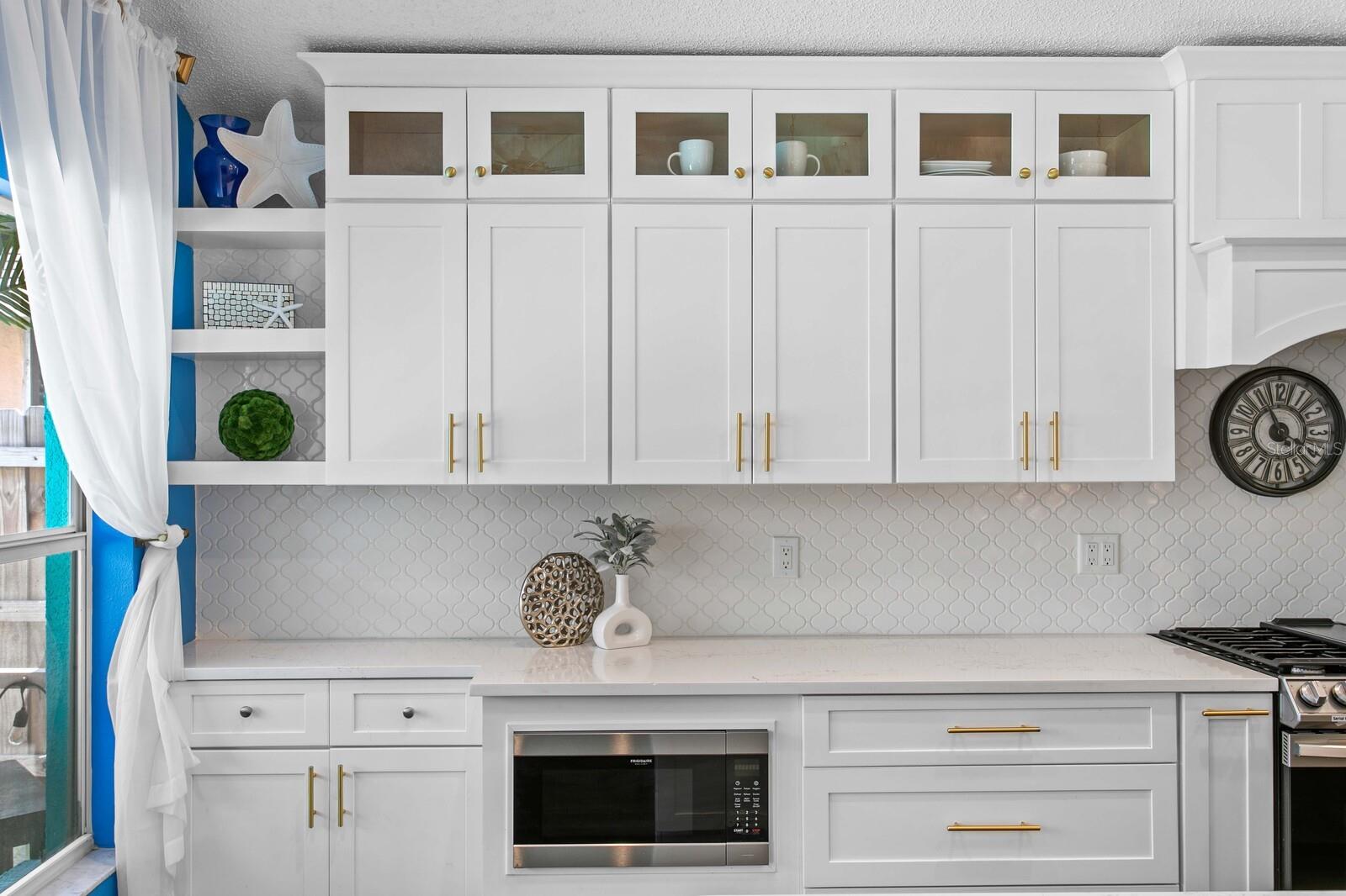 Triple-stack cabinets with glass fronts