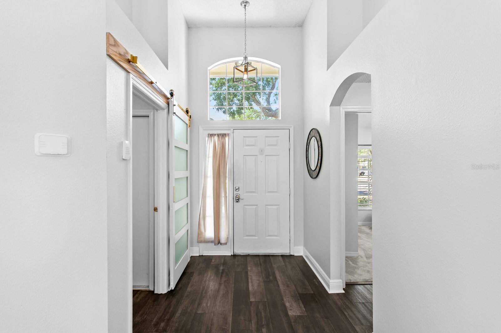 Welcoming foyer with 12ft ceilings throughout