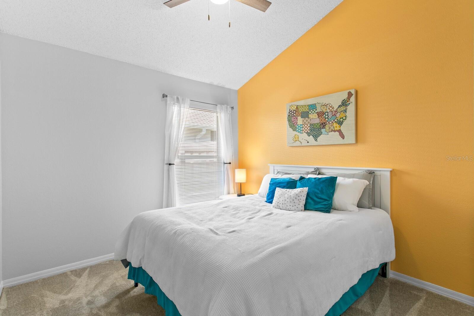 3rd bedroom with vaulted ceilings