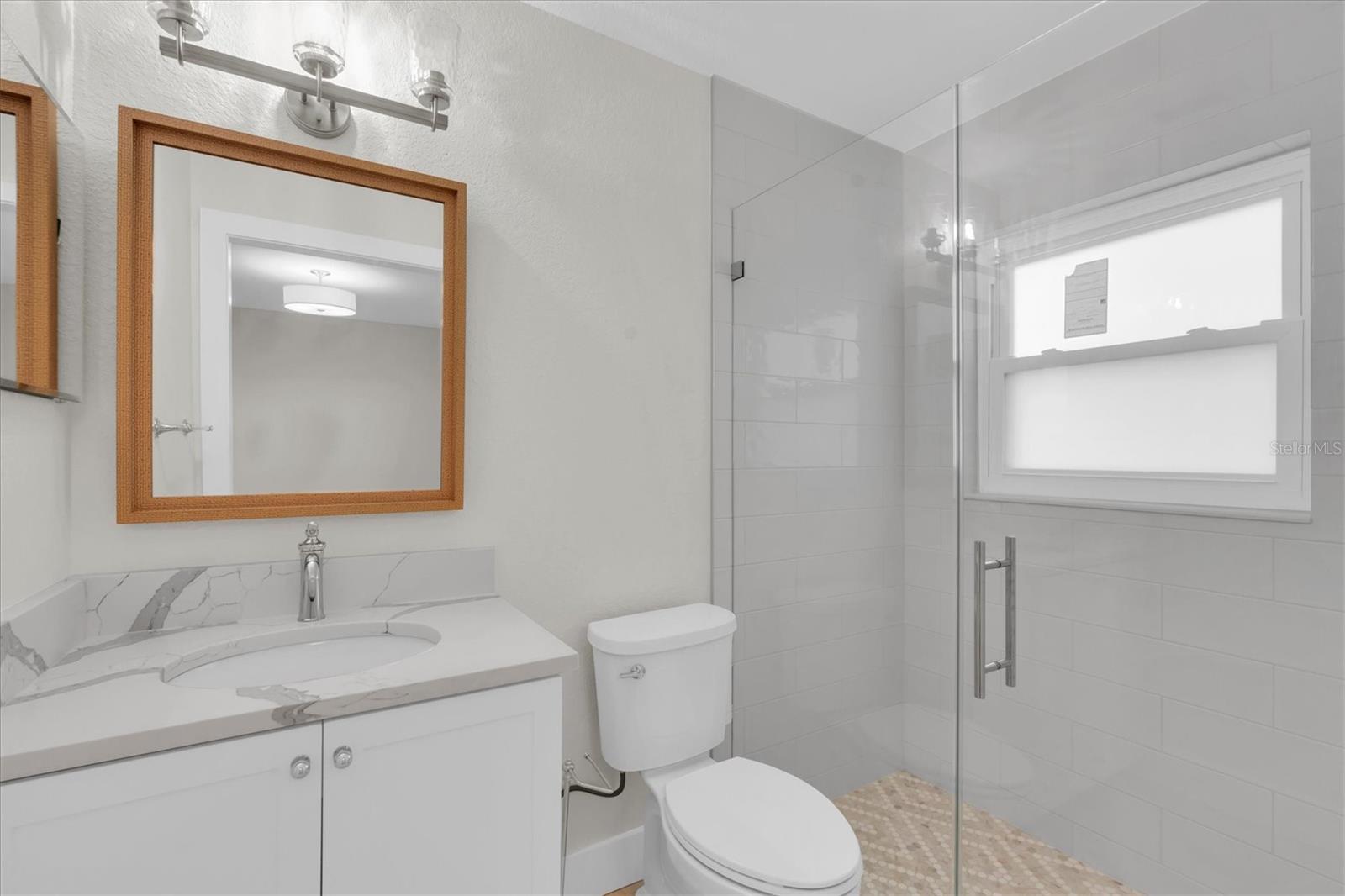 En Suite bath with walk in shower - all new.