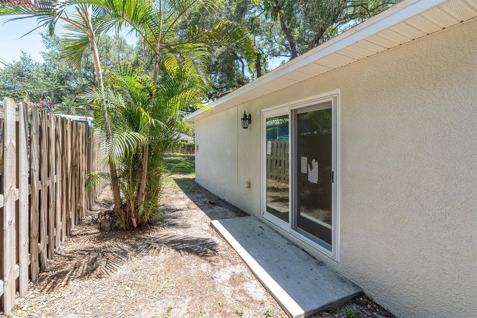 Side yard - brand new sliding doors