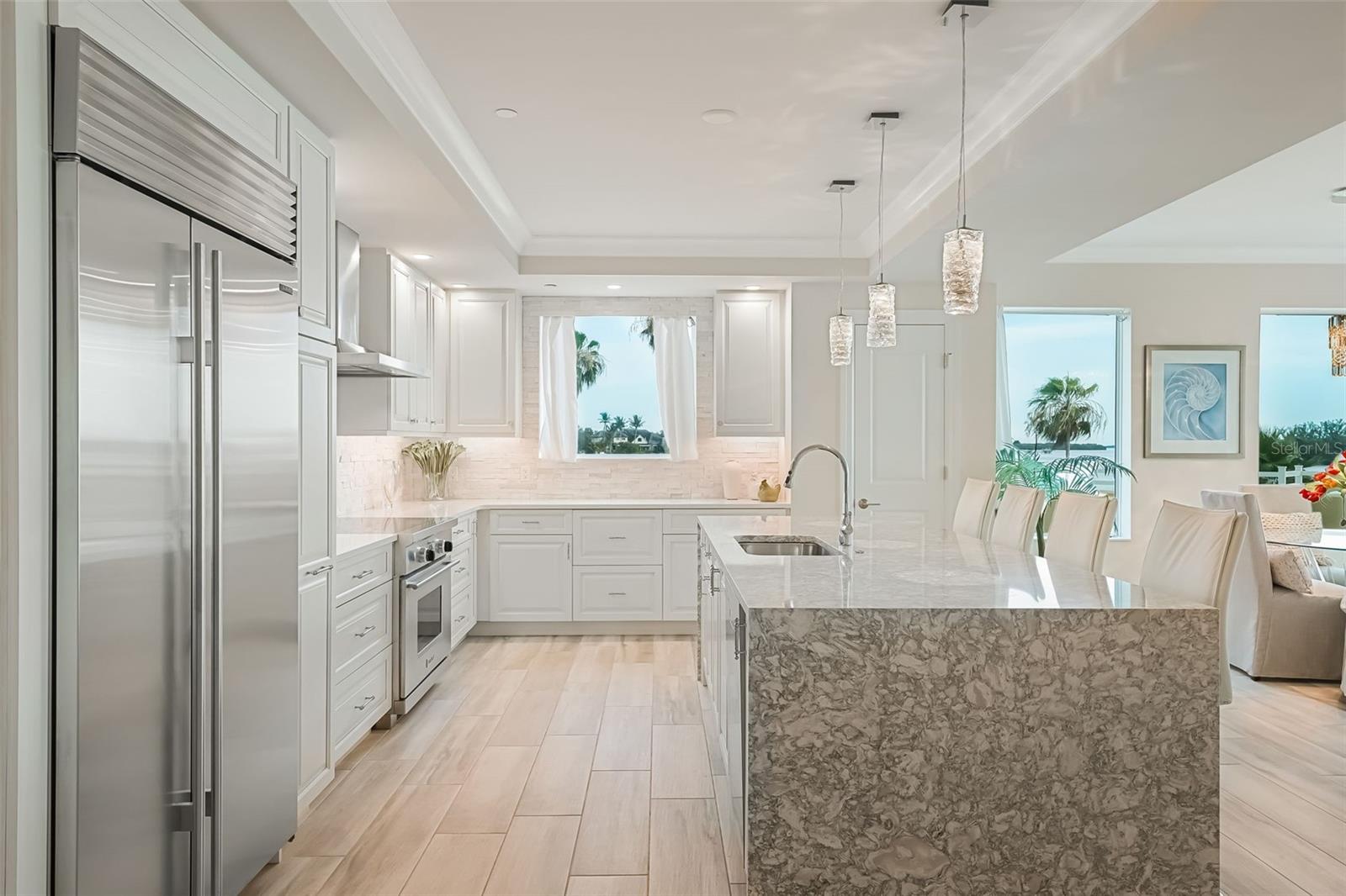 This shows all the natural light that the kitchen has and the abundant amount of countertop space you will have.