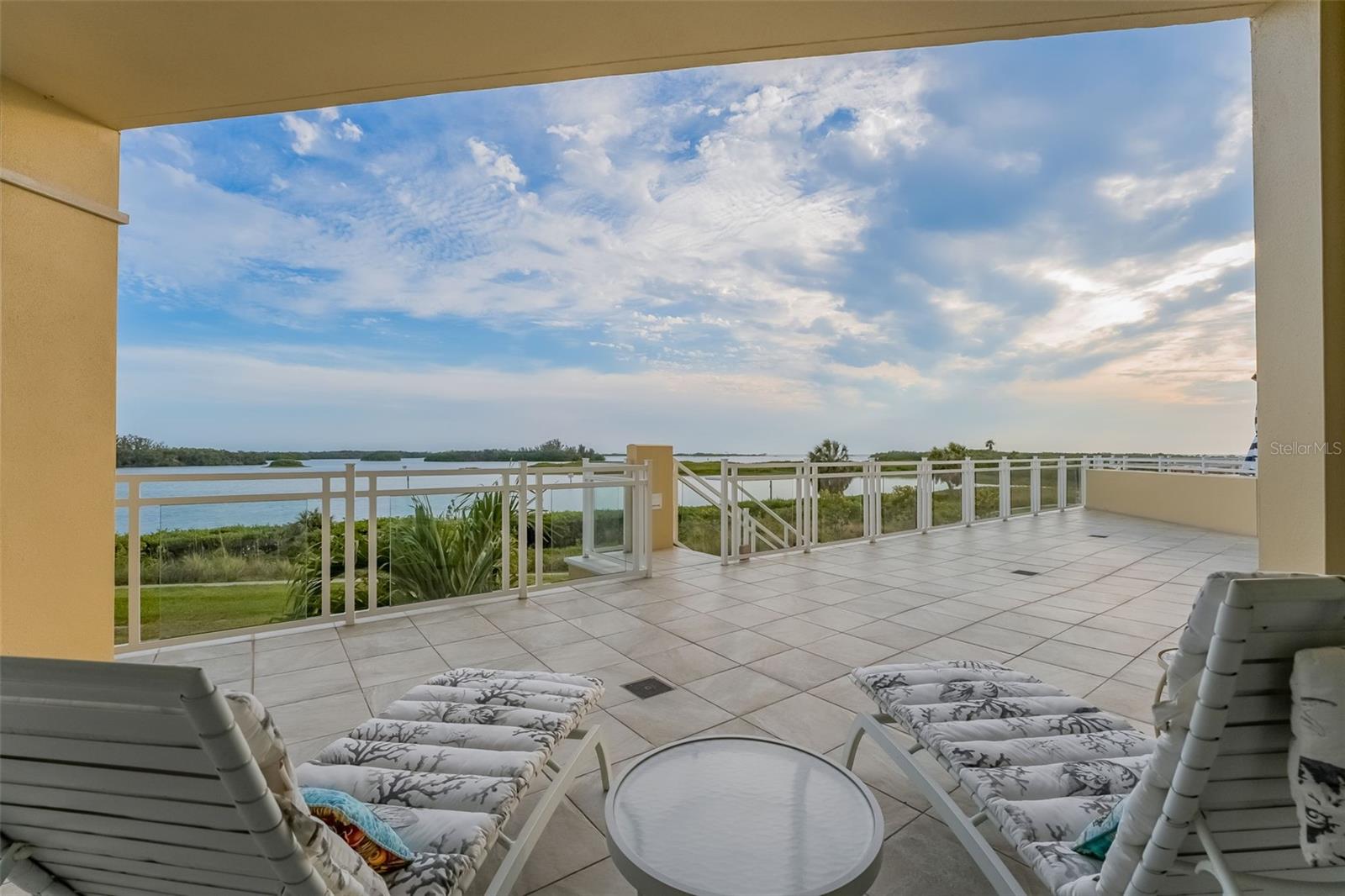 Enjoy the view from your balcony overlooking the water!  What a nice way to enjoy nature & relax.