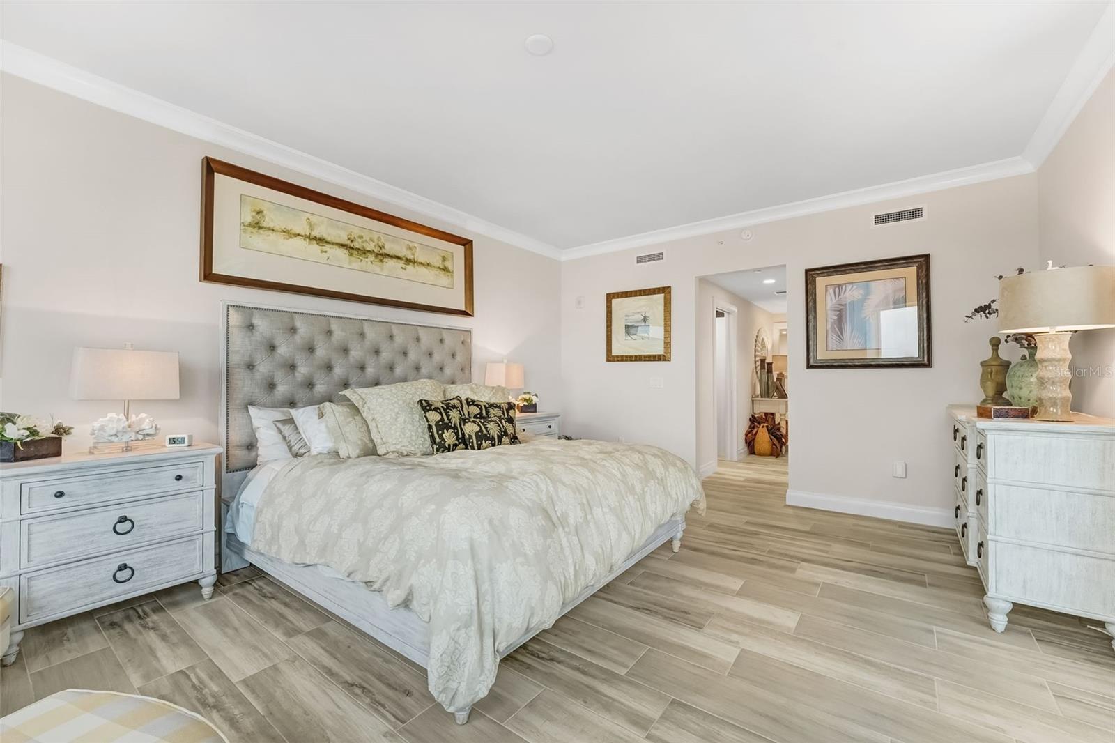 Primary bedroom with 2 walk-in closets.