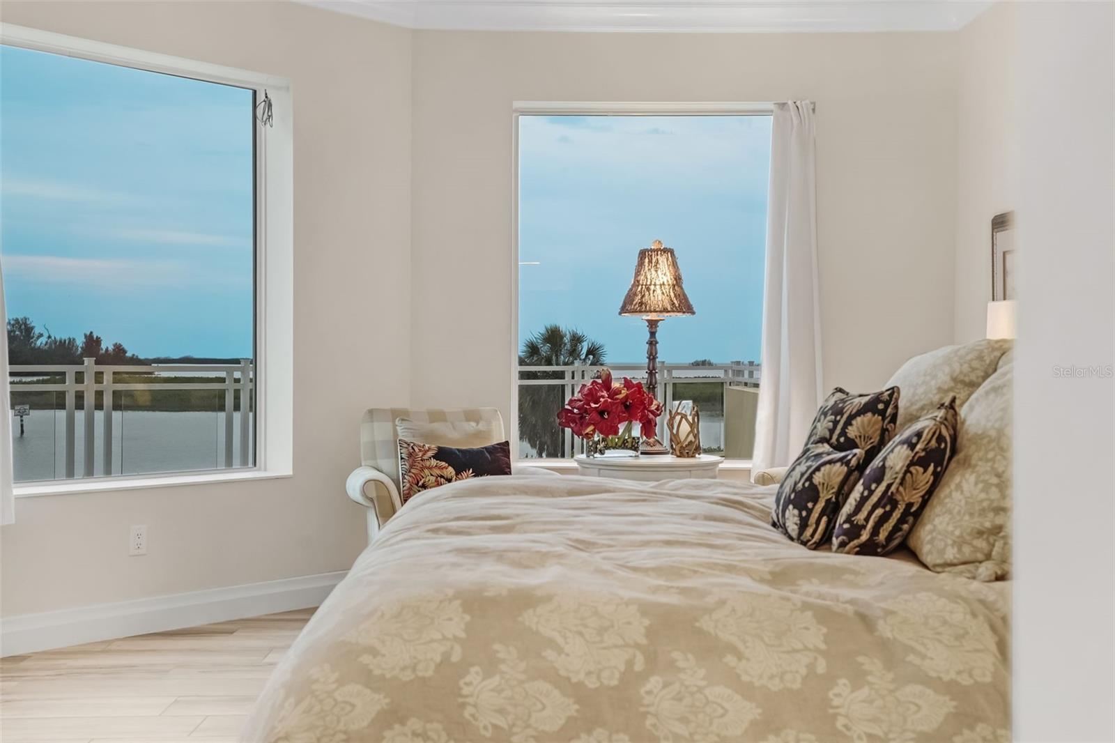 A closer look at the primary bedroom view - looking straight out to the water