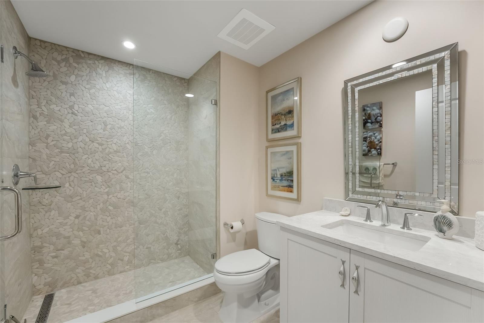 Ensuite bathroom with Shower attached to the gest bedroom.
