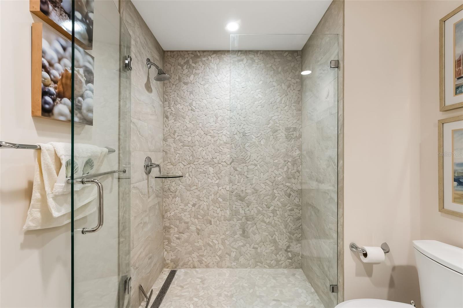 This ensuite bathroom has a nice walk-in shower
