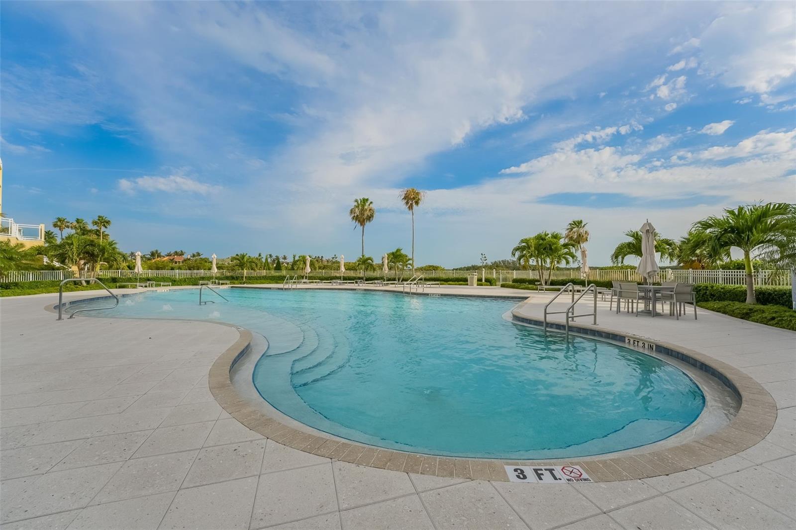 The pool is right next to the building