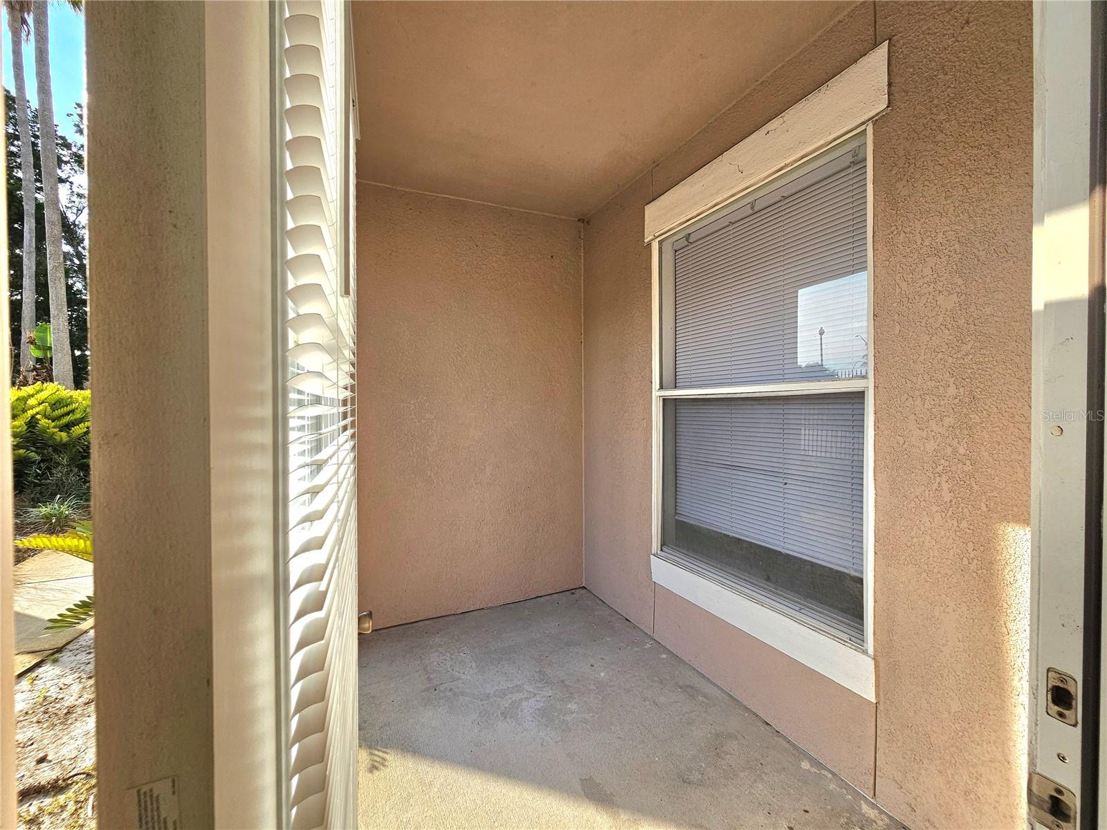 Patio on the side.  You can get to it from the kitchen door