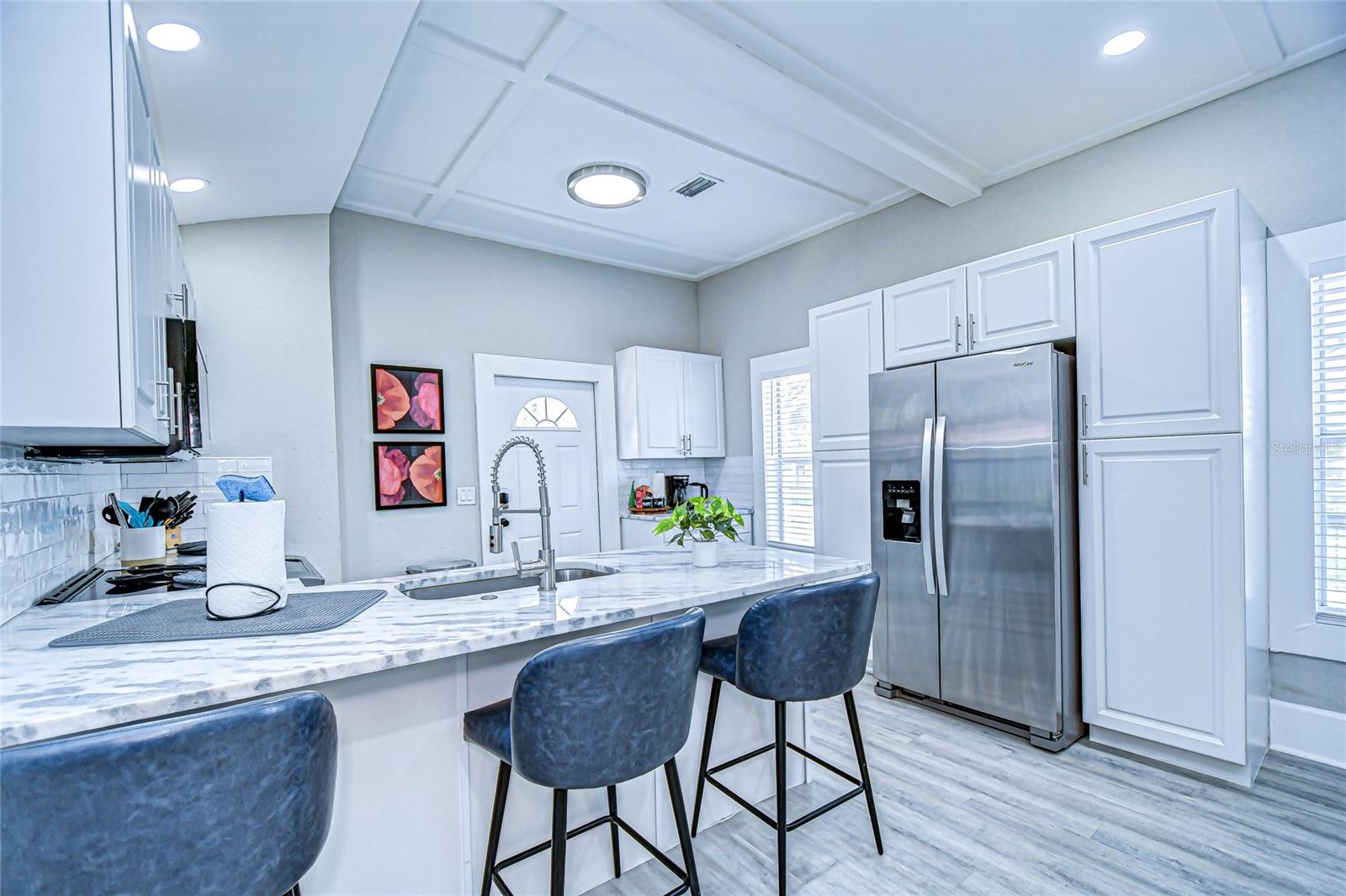 Renovated kitchen with stainless steel appliances