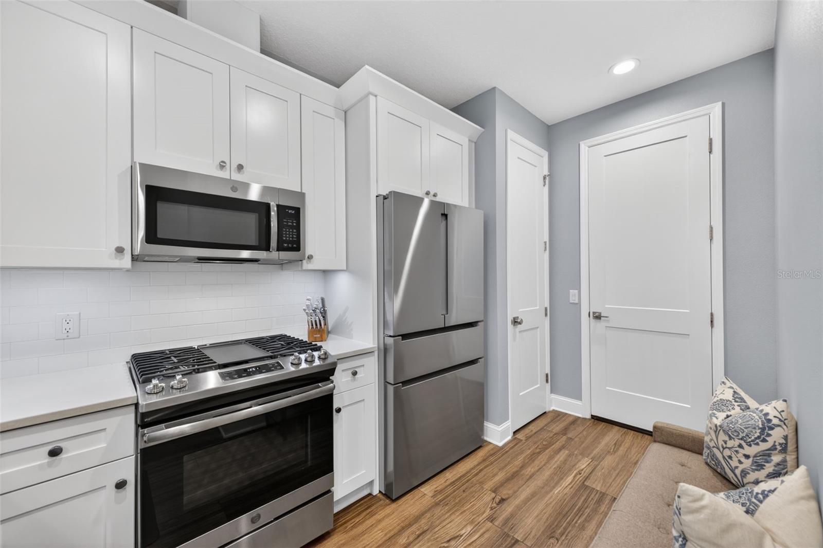 The kitchen is large enough where you have a small sitting area