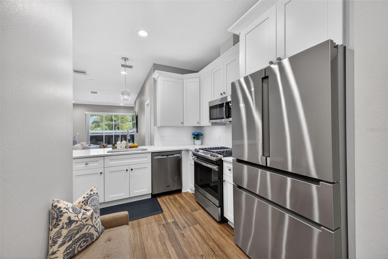 Looking into the kitchen from the garage entry door