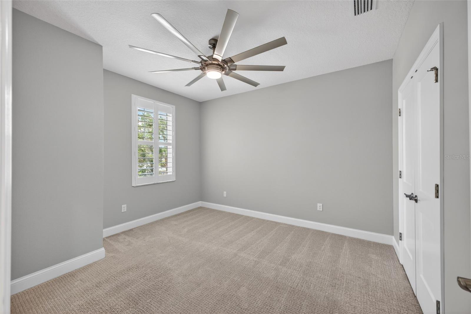 Second Bedroom with Built In Closet and Fanimation Fan