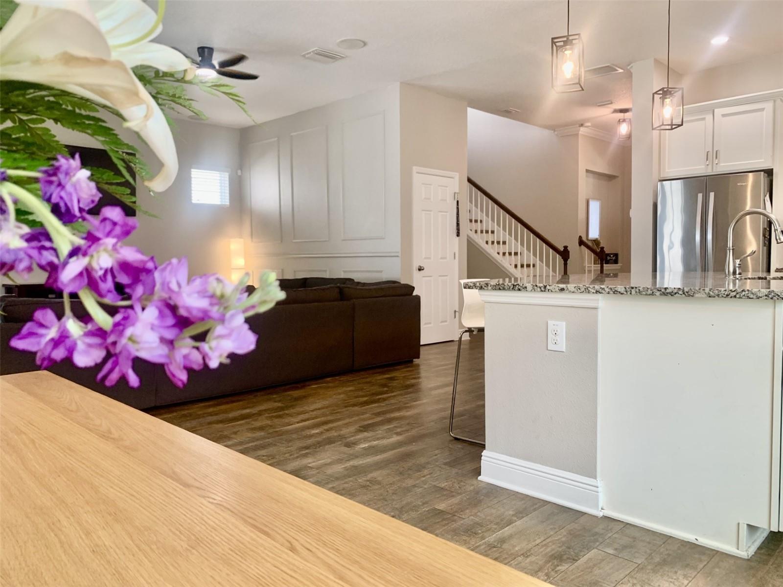 View of dining room to kitchen and family room
