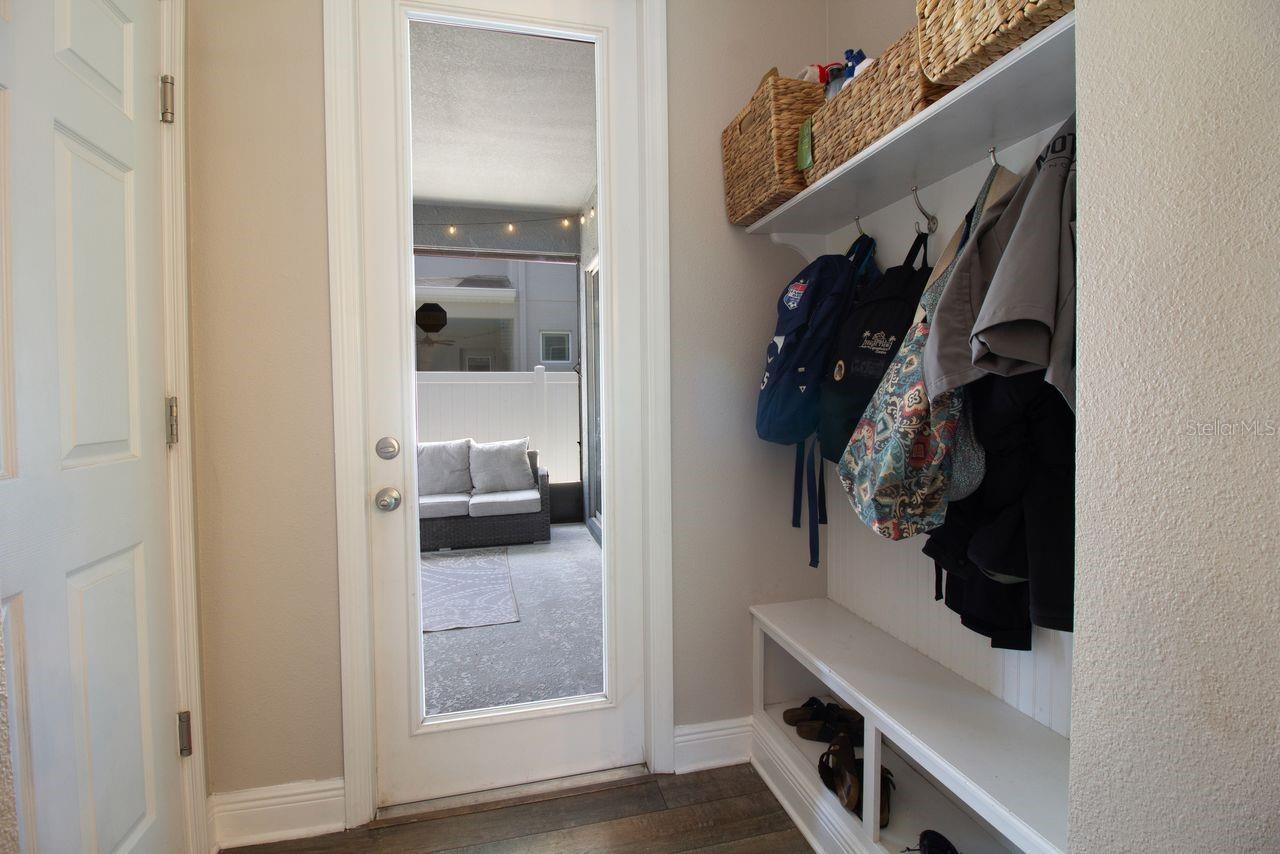 Mud room connects garage to family room to lanai