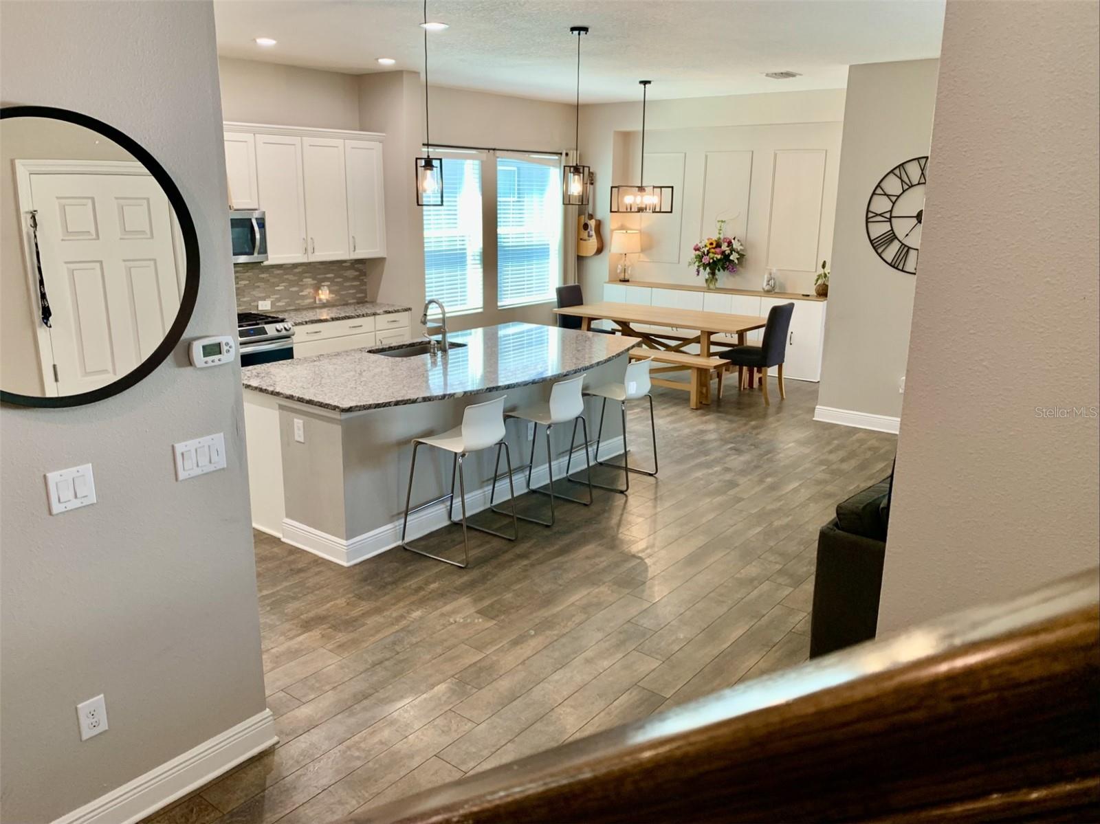 View of kitchen from base of stairs