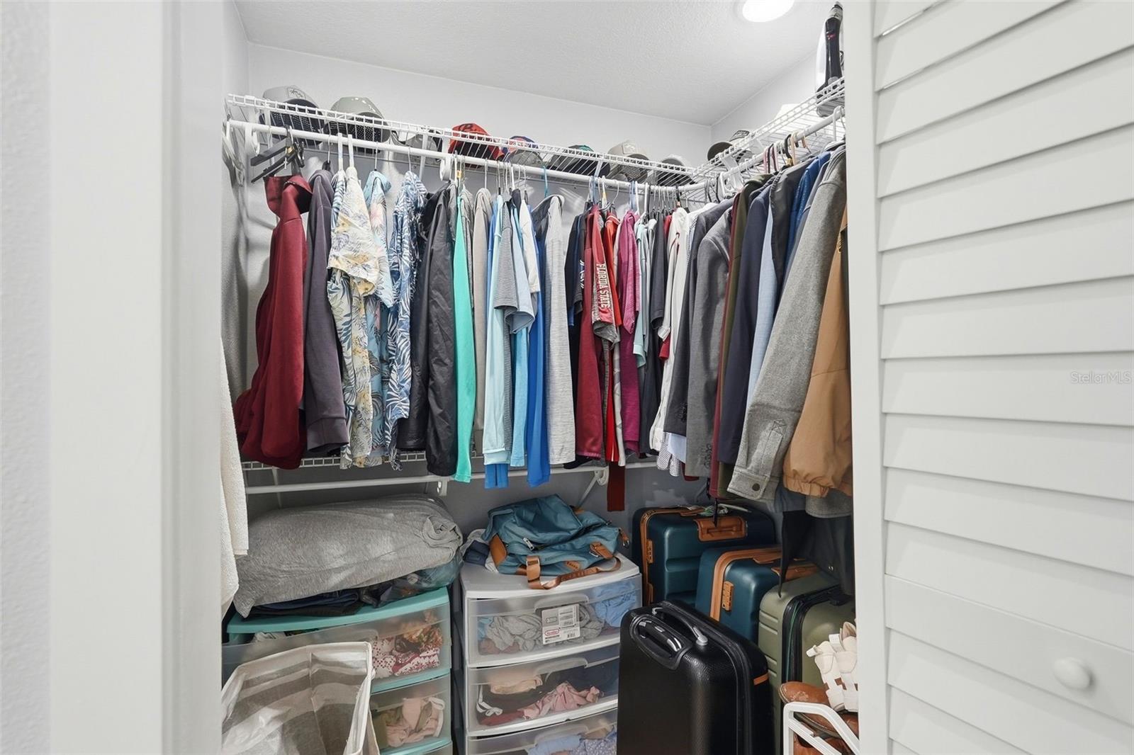 Primary bedroom walk-in closet 2