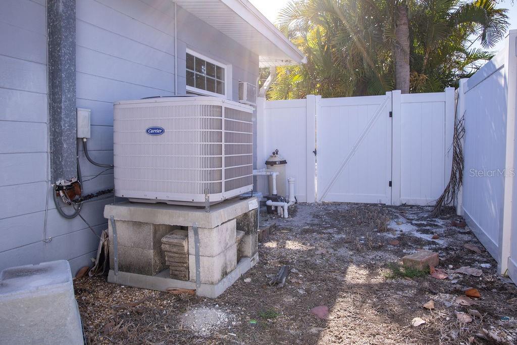 Right side yard with two gates