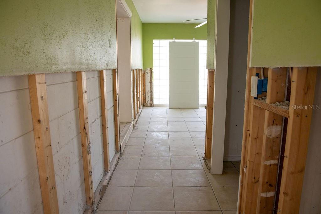 Hallway to laundry and bonus room
