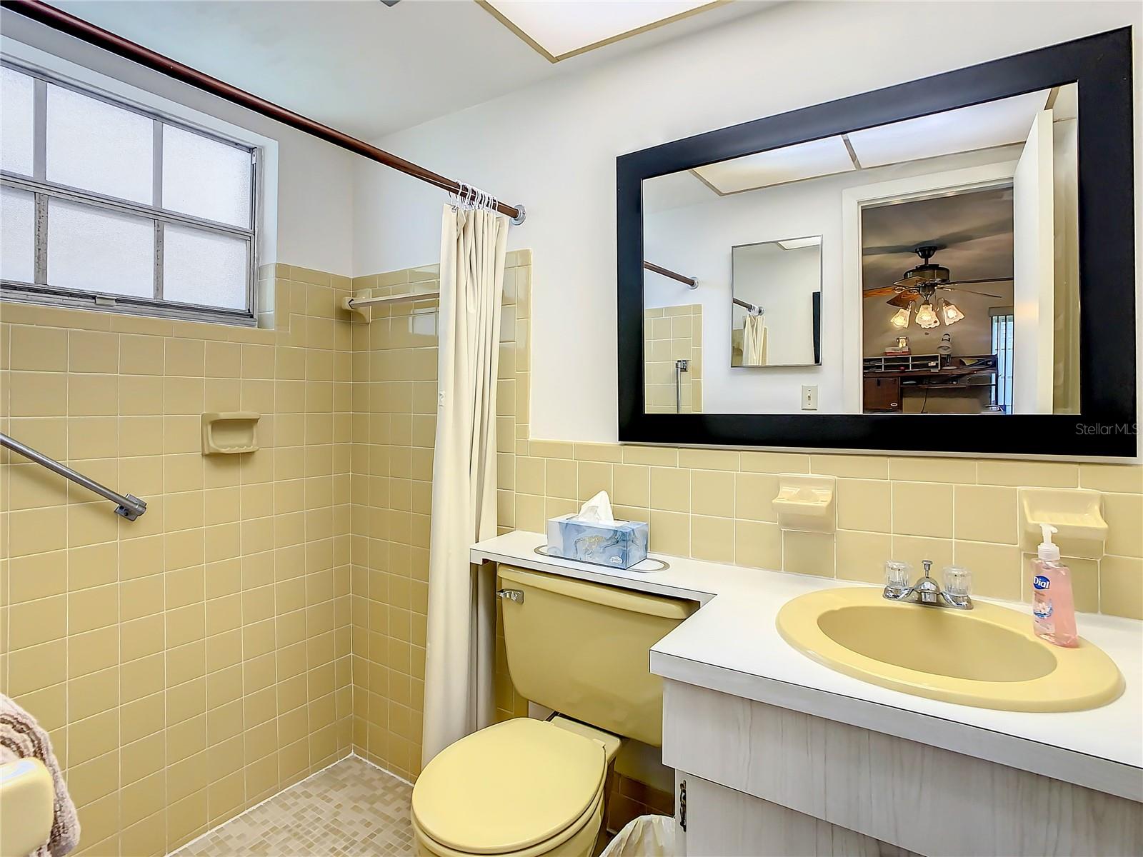 primary bathroom with walk in shower