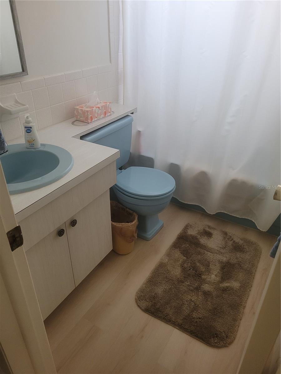 guest bathroom with new waterproof vinyl flooring