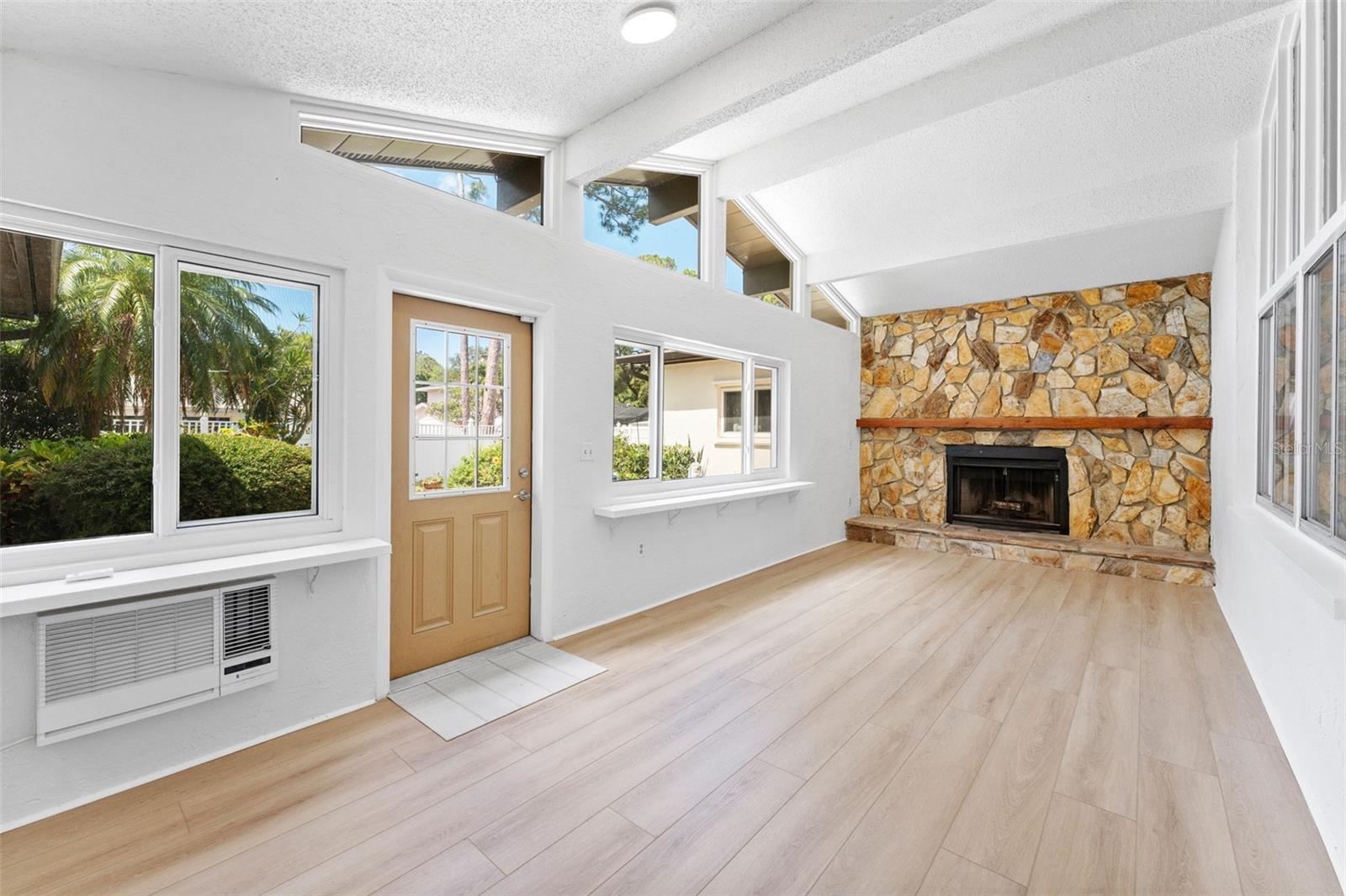 Florida Room with wood burning fireplace