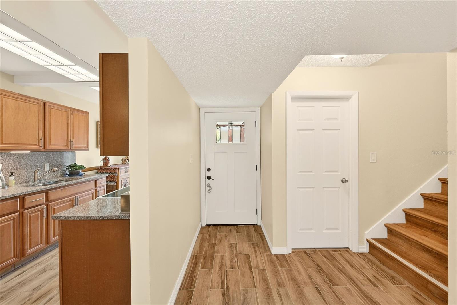 Entry, laundry room behind door