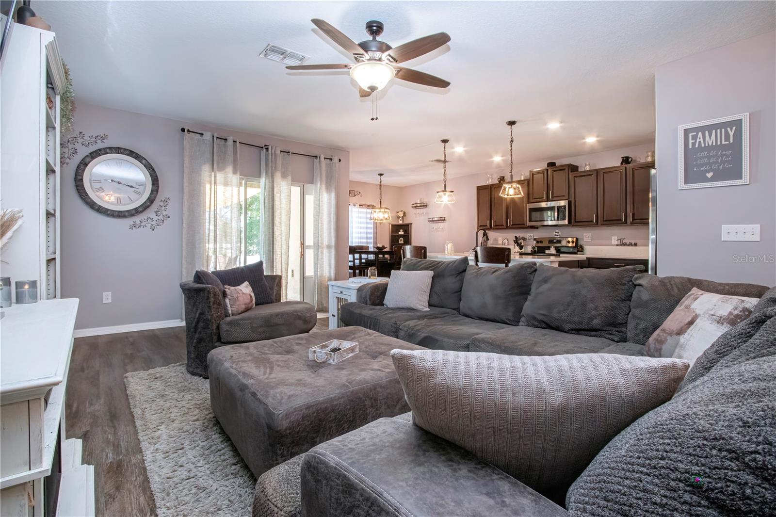 View Of Open Concept Livingroom/Kitchen Combo New Fixtures And Lighting