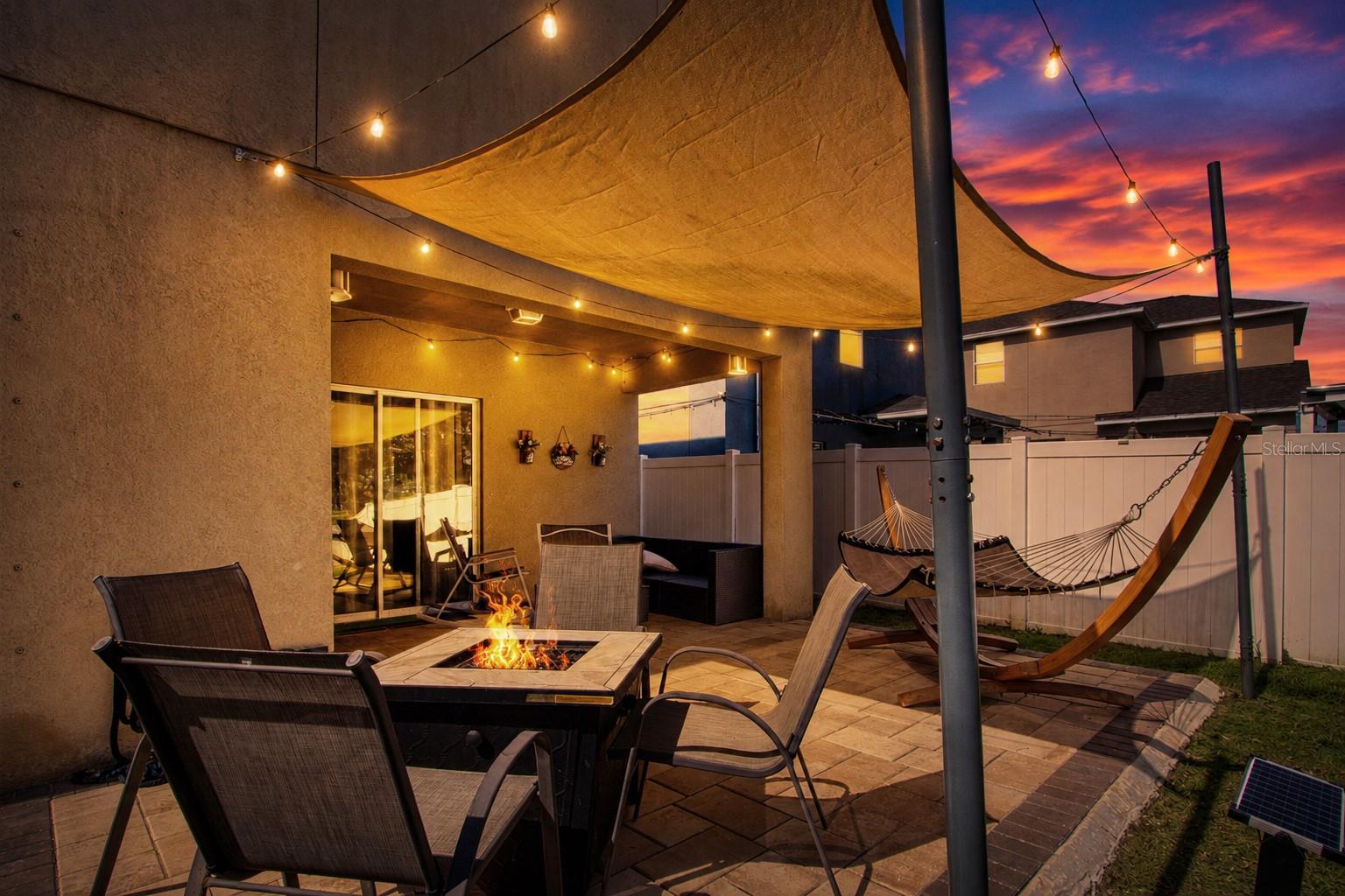 Twilight Of Back Patio And Covered Porch