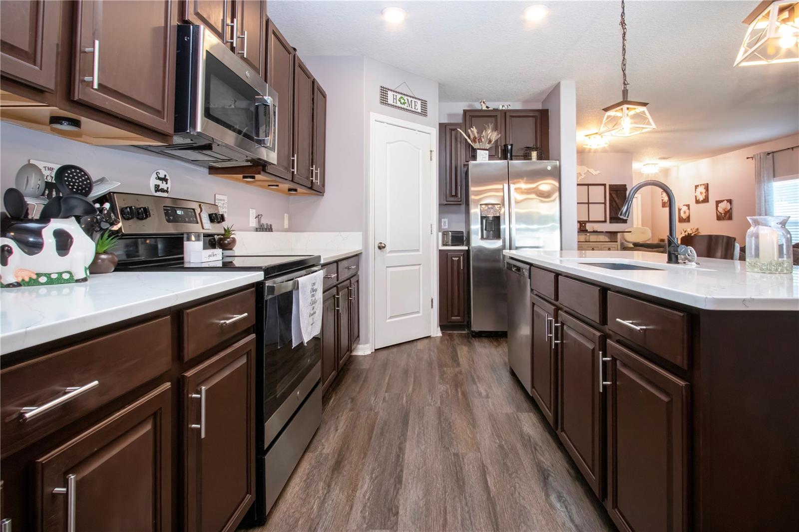 Ample Kitchen Cabinets and Luxury Vinyl Flooring