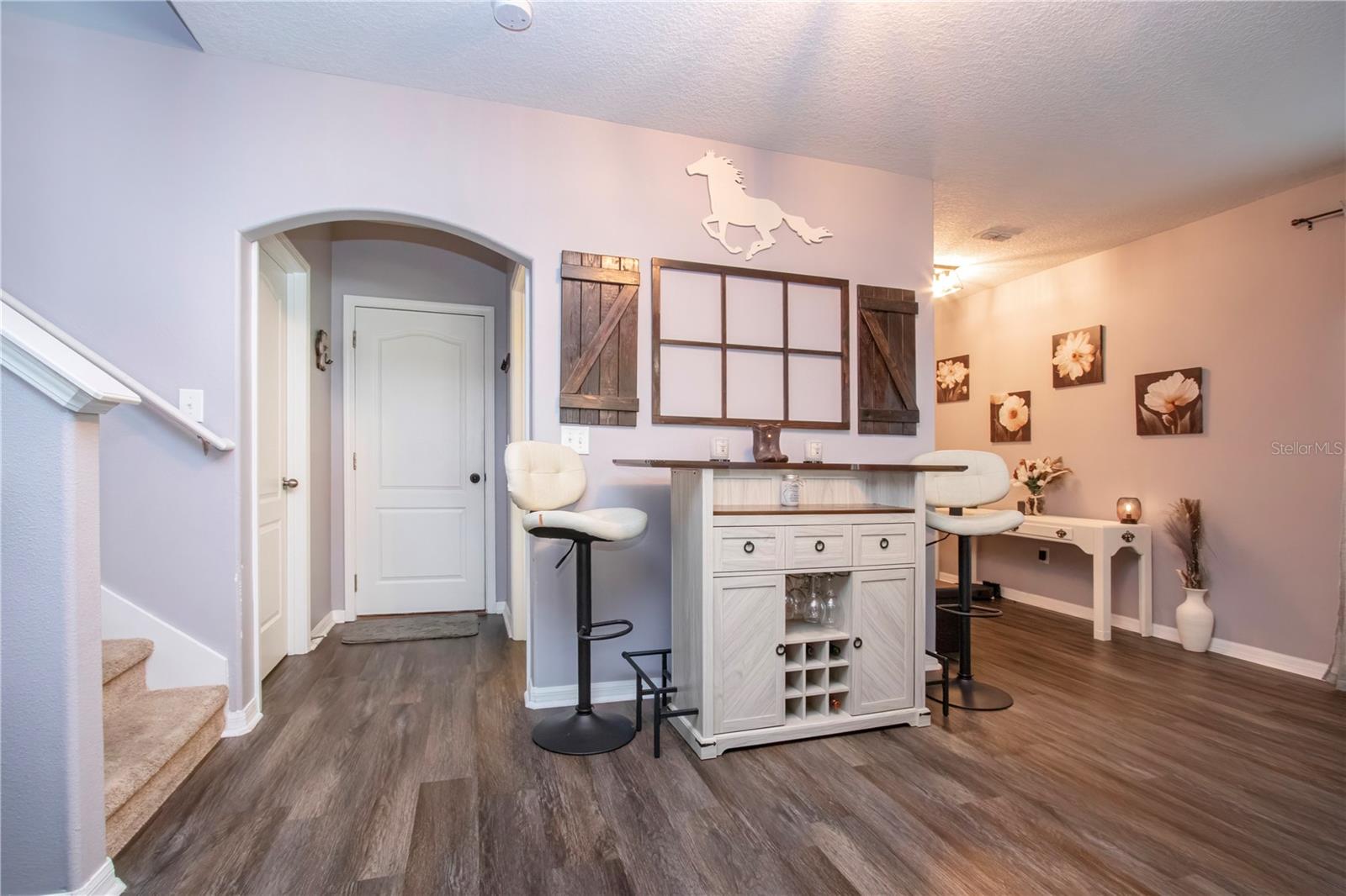 View Of The Bar Leading To The Garage And Laundry Room