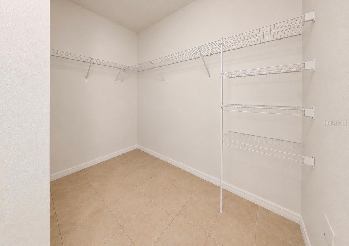 Primary Bedroom - Walk-In Closet
