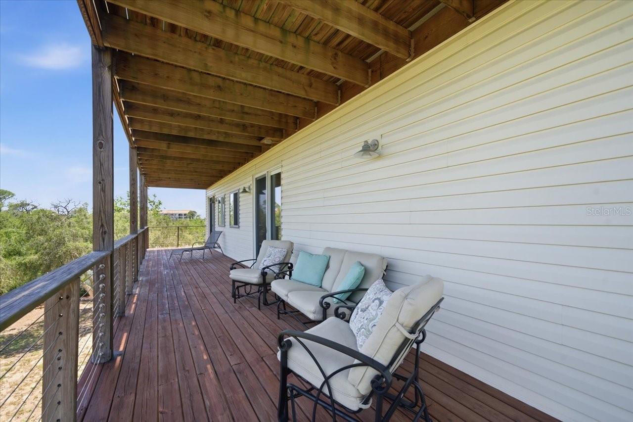 Covered balcony/deck from 2nd level-Primary and 3rd bedroom access