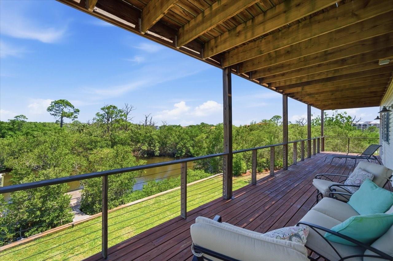 Covered balcony/deck from 2nd level-Primary and 3rd bedroom access