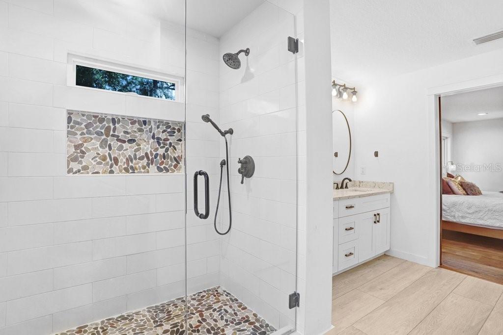 Stand up shower in the primary bathroom